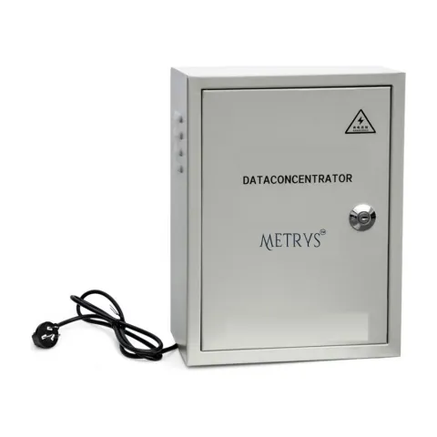 A Metrys M-Bus data concentrator in a grey wall-mounted steel enclosure with a locking door and mains lead.