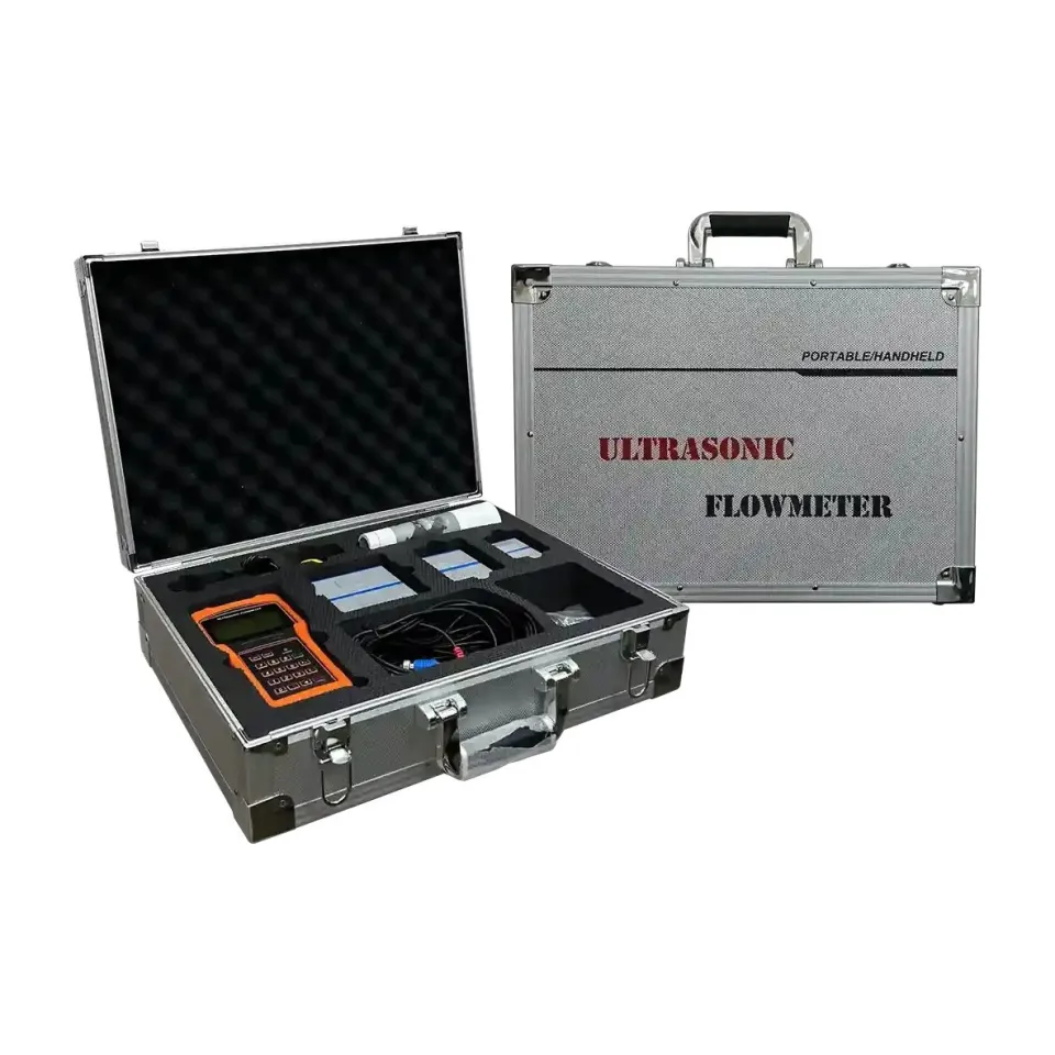 A Metrys portable ultrasonic flow meter kit in an open aluminium case, with an orange handheld unit, clamp-on transducers and cables in foam.