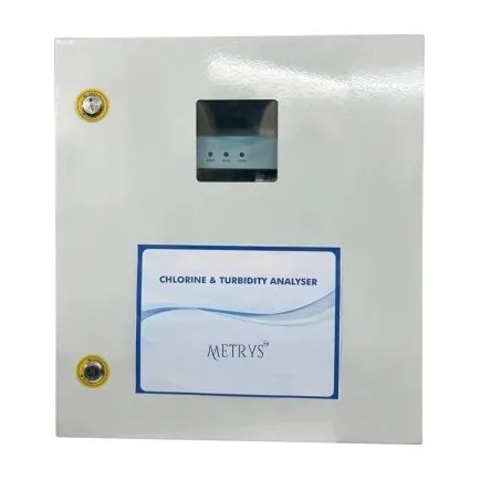 A Metrys online chlorine and turbidity analyser in a light grey wall cabinet, with a small window over its indicator lamps and a door label reading Chlorine & Turbidity Analyser.