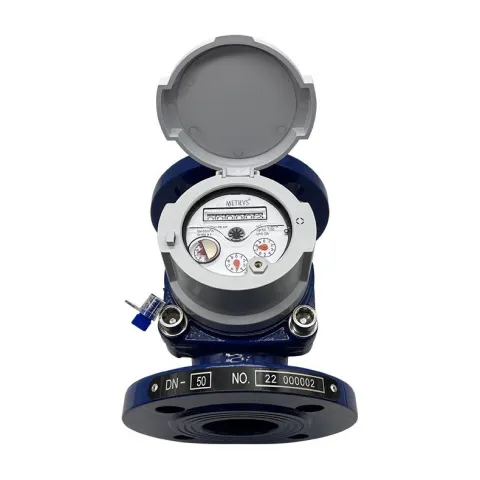A Metrys R160 Woltmann bulk water meter seen end-on, with the lid open over the register and a DN50 number plate on the flange.