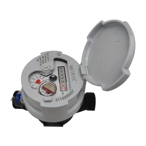 The dial of a Metrys single-jet water meter with a copper-and-glass register, seen from above with the grey lid open.