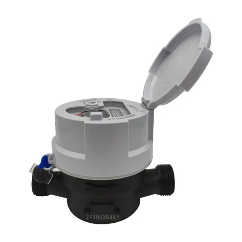 A Metrys single-jet water meter with a copper-and-glass register seen from the side, grey lid open, on a black body with threaded ends.