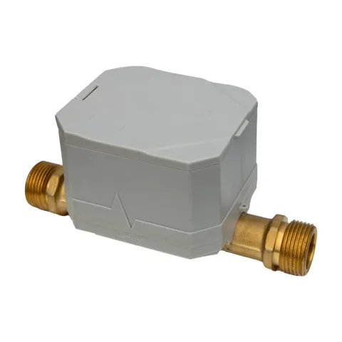 A Metrys ultrasonic water meter seen from the front corner, with its grey housing closed on a brass-coloured body with threaded ends.