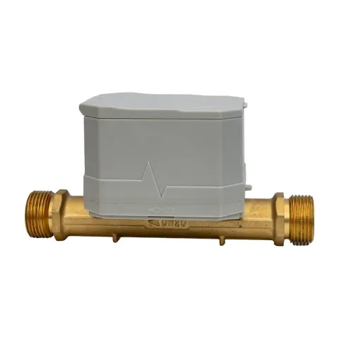 A Metrys ultrasonic water meter from the side, with the grey housing closed on a straight brass-coloured body marked DN20.